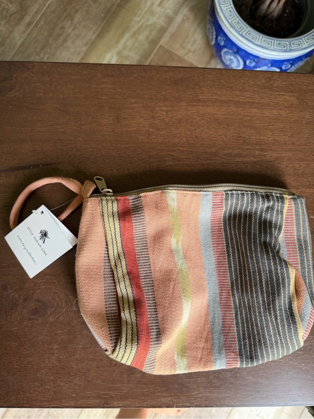 Noonday Collection Striped Wristlet in Peach, Red, Yellow, Blue and Gray